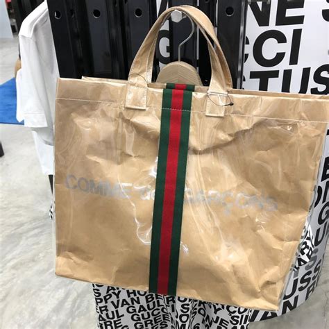 cdg x gucci